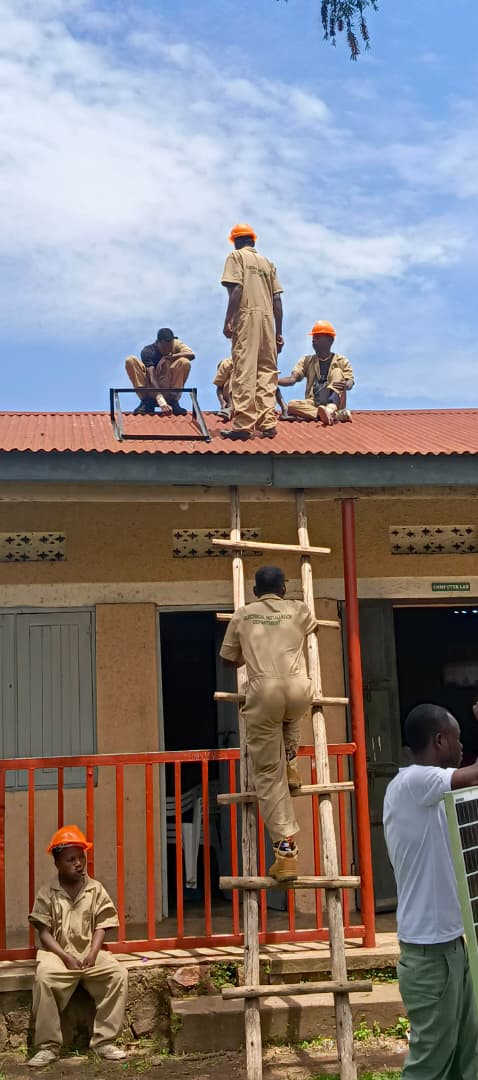 Group of youth celebrating solar project completion